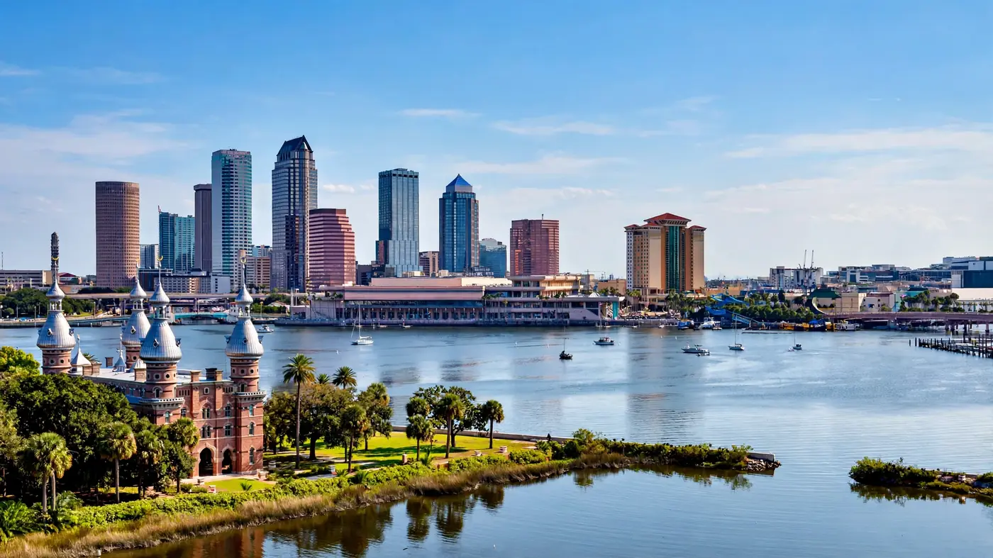 Water damage restoration in Trinity, FL: the Tampa skyline across the river with historic domed minarets